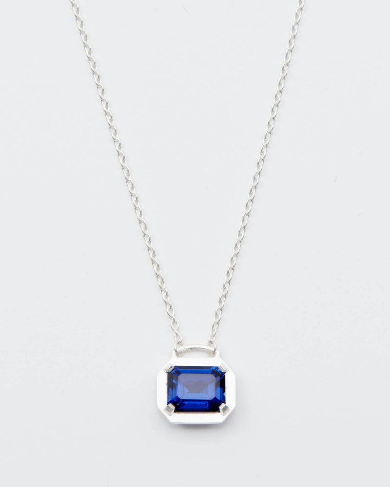 Blue star sapphire pendant necklace in silver bezel setting with sterl